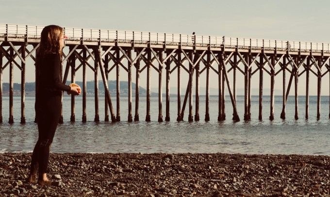 Child looking at pier
